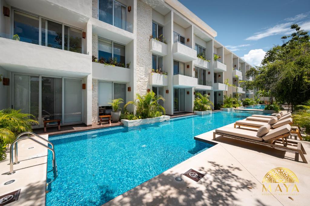 Bazén v ubytování Nhoa Tulum Aparthotel by Maya PM nebo v jeho okolí