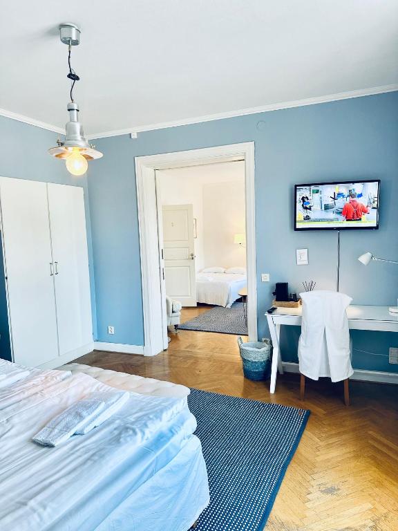 TV a/nebo společenská místnost v ubytování Wisby Residence