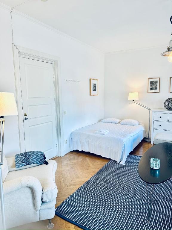Postel nebo postele na pokoji v ubytování Wisby Residence