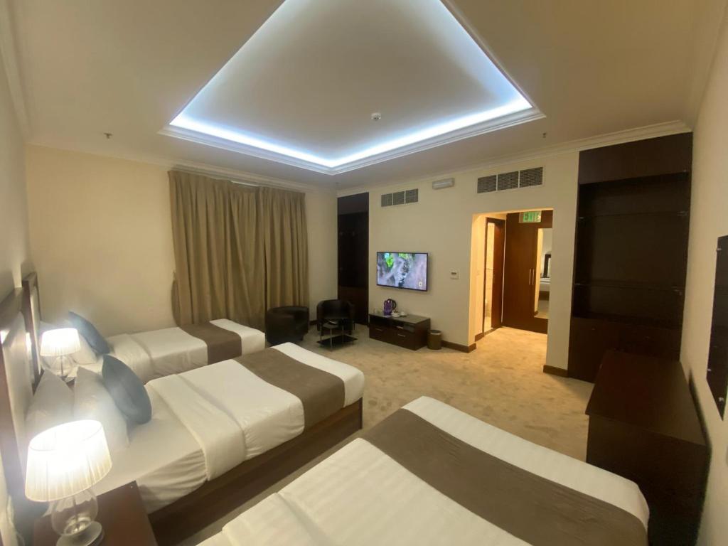 TV a/nebo společenská místnost v ubytování A Line Hotel