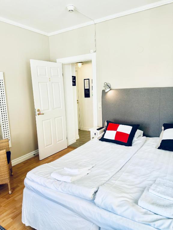 Postel nebo postele na pokoji v ubytování Wisby Residence