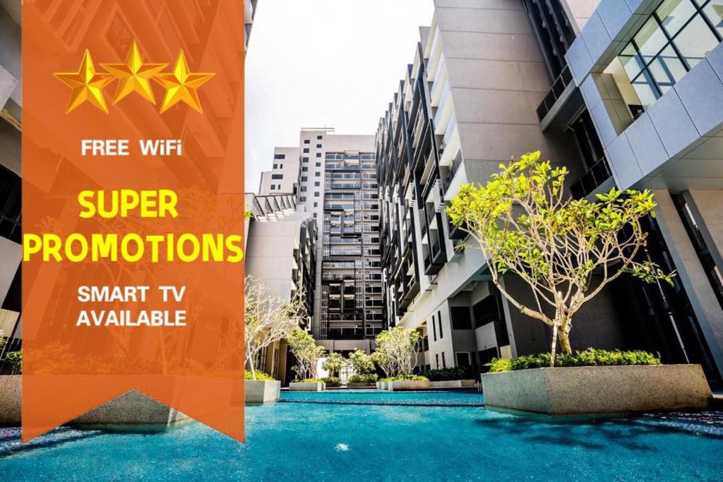 a sign that reads superutions next to a building at Imperio Private Bathtub Melaka Town By MICASA GROUP in Melaka