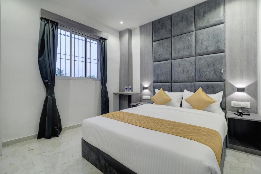 Postel nebo postele na pokoji v ubytování Hotel Isra International, BKC
