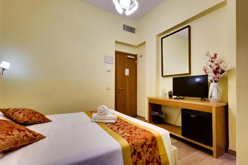 TV a/nebo společenská místnost v ubytování Hotel Terminal