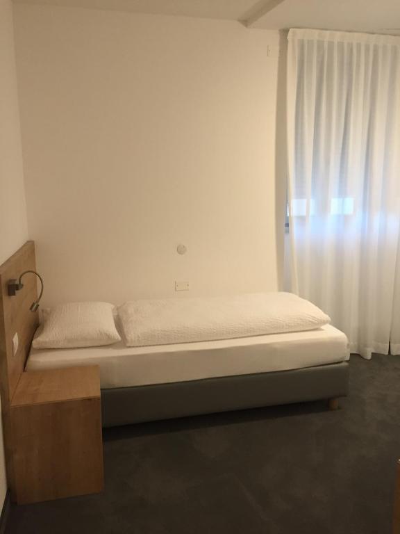 Postel nebo postele na pokoji v ubytování R&B La Calzoleria