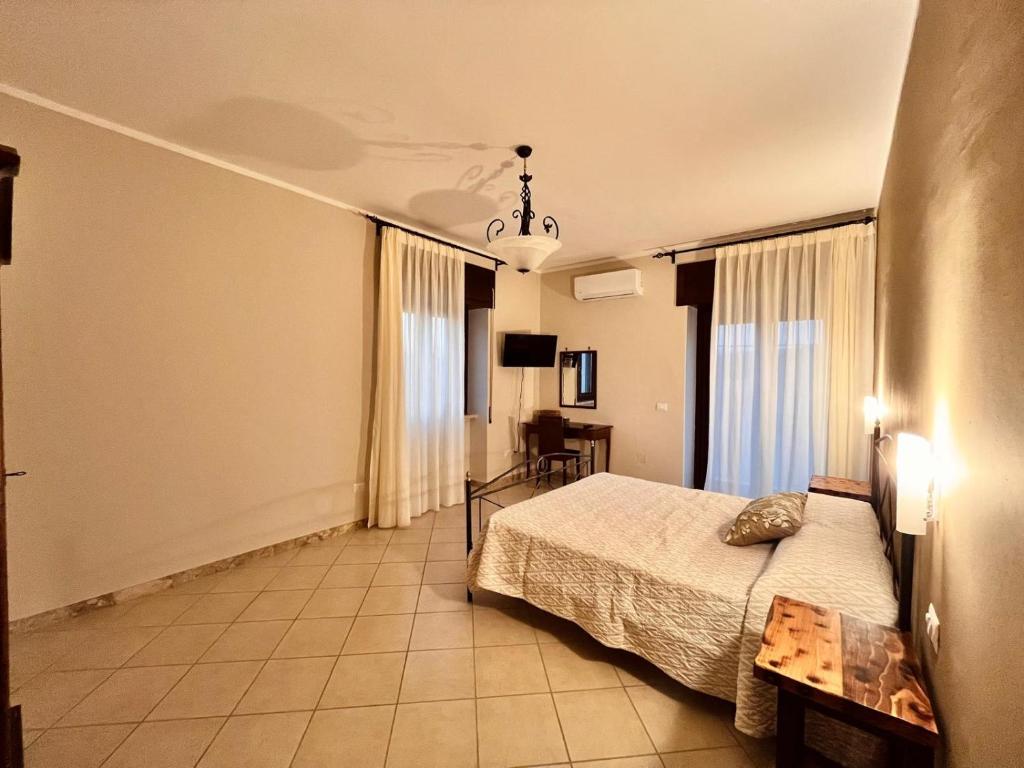 Postel nebo postele na pokoji v ubytování B&B Tempa Rossa