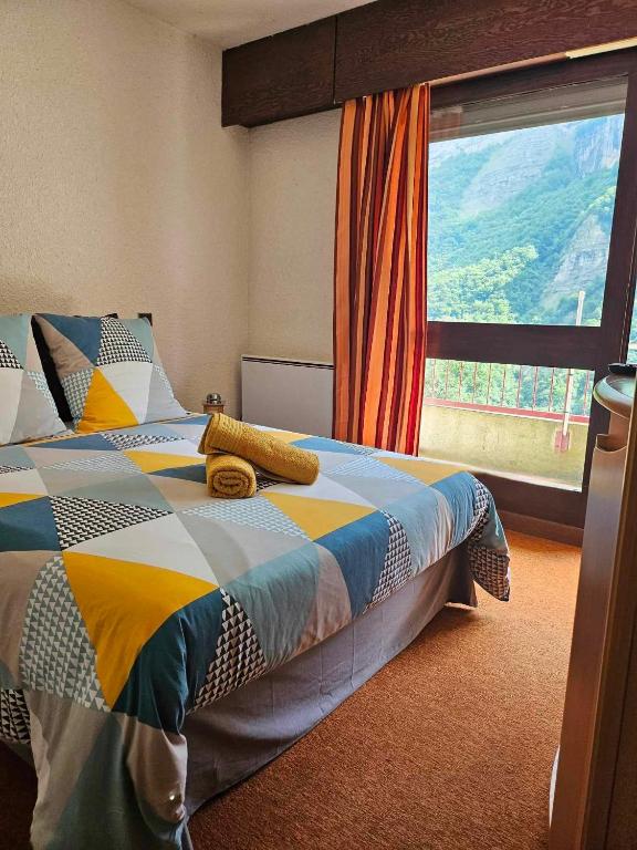 Postel nebo postele na pokoji v ubytování Cinéma, Chambre Privée Au Le Refuge Du Phoenix