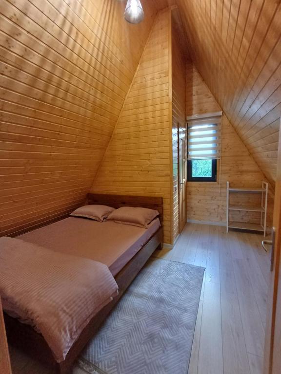 Postel nebo postele na pokoji v ubytování COLȚ DE RAI - A Frame