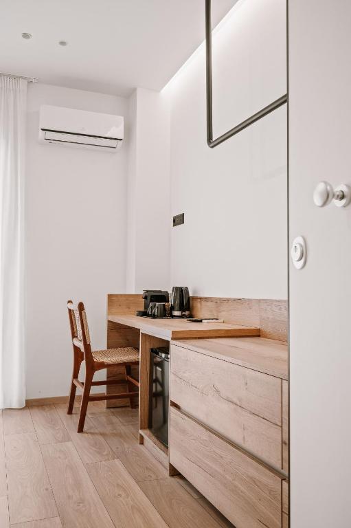 Kuchyň nebo kuchyňský kout v ubytování Plānis Str Urban Suites by Semavί