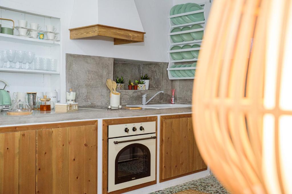 Kuchyň nebo kuchyňský kout v ubytování Melitini's House
