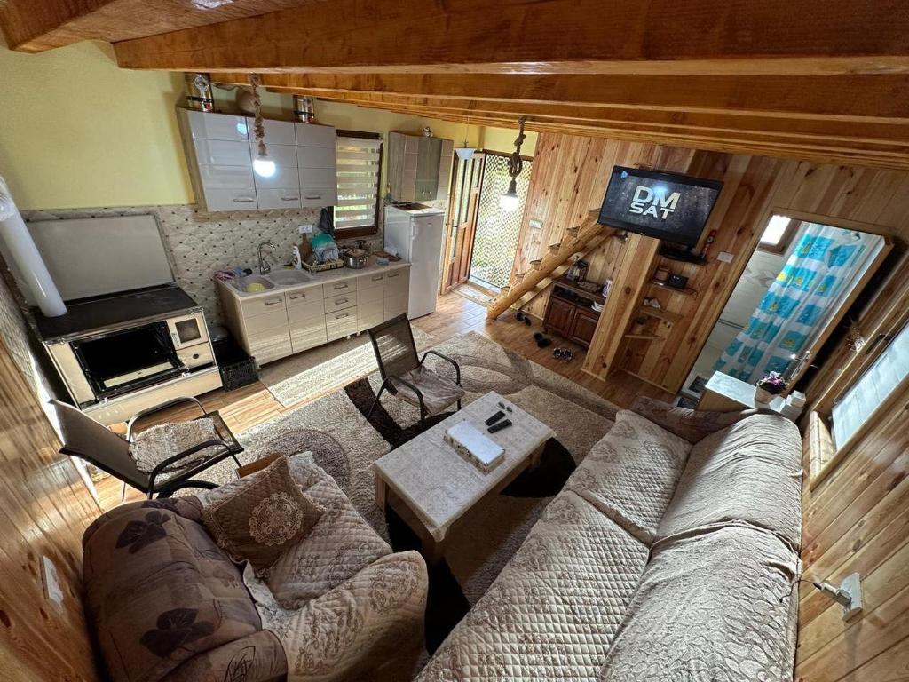 Televiisor ja/või meelelahutuskeskus majutusasutuses Cottage Wrong turn