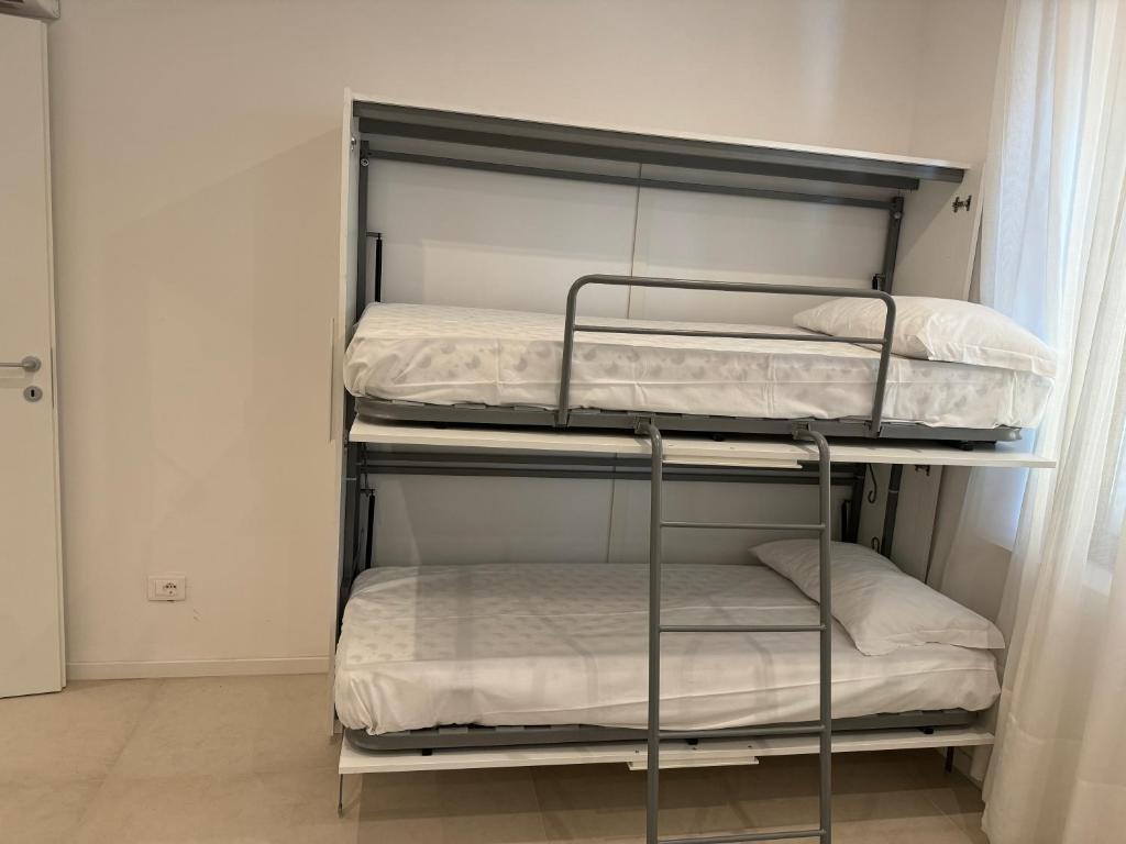 Postel nebo postele na pokoji v ubytování B&B La Coccinella