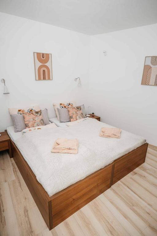 Postel nebo postele na pokoji v ubytování Kék-Ház Murau Centrum