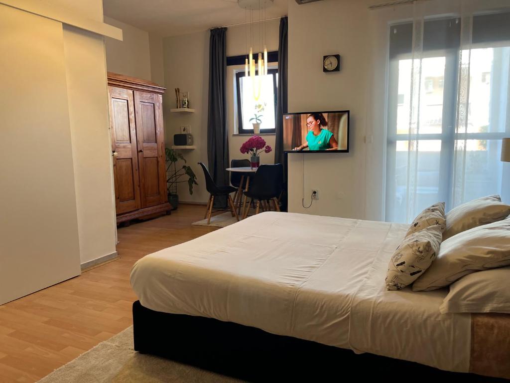 Postel nebo postele na pokoji v ubytování Apartments Porec