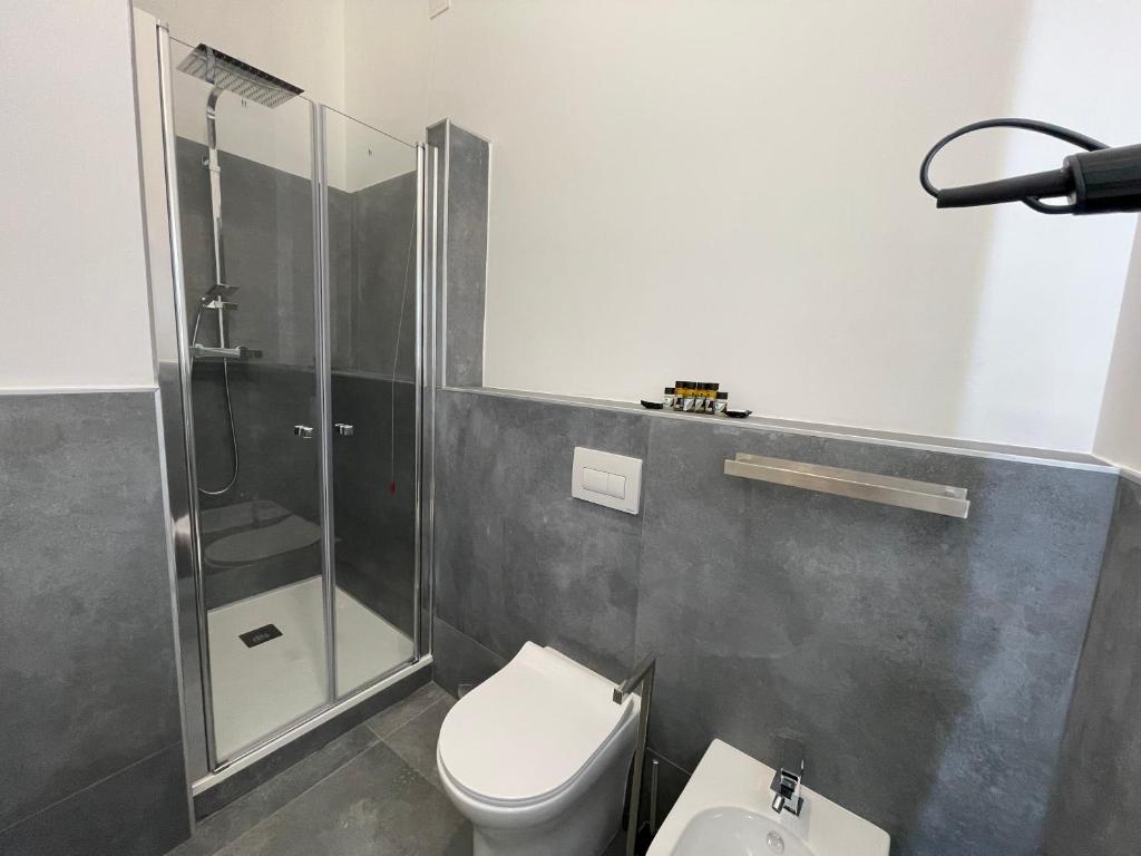 Koupelna v ubytování Le Cisterne Guest house Suite&Rooms