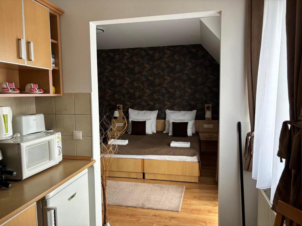 Kuchyňa alebo kuchynka v ubytovaní Tip Top Wellness Apartman Zalakaros
