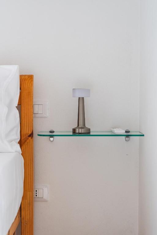 Postel nebo postele na pokoji v ubytování Titi's Villa