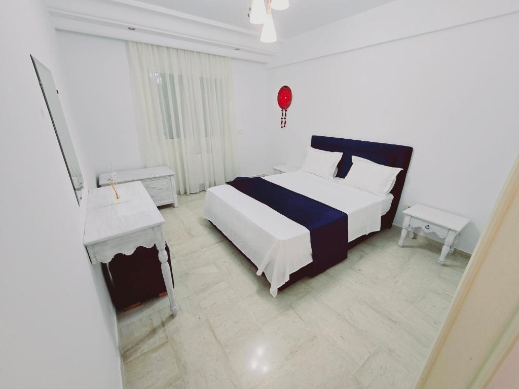 Postel nebo postele na pokoji v ubytování Karray Home Appartement Salon 2 RDC avec Jardin