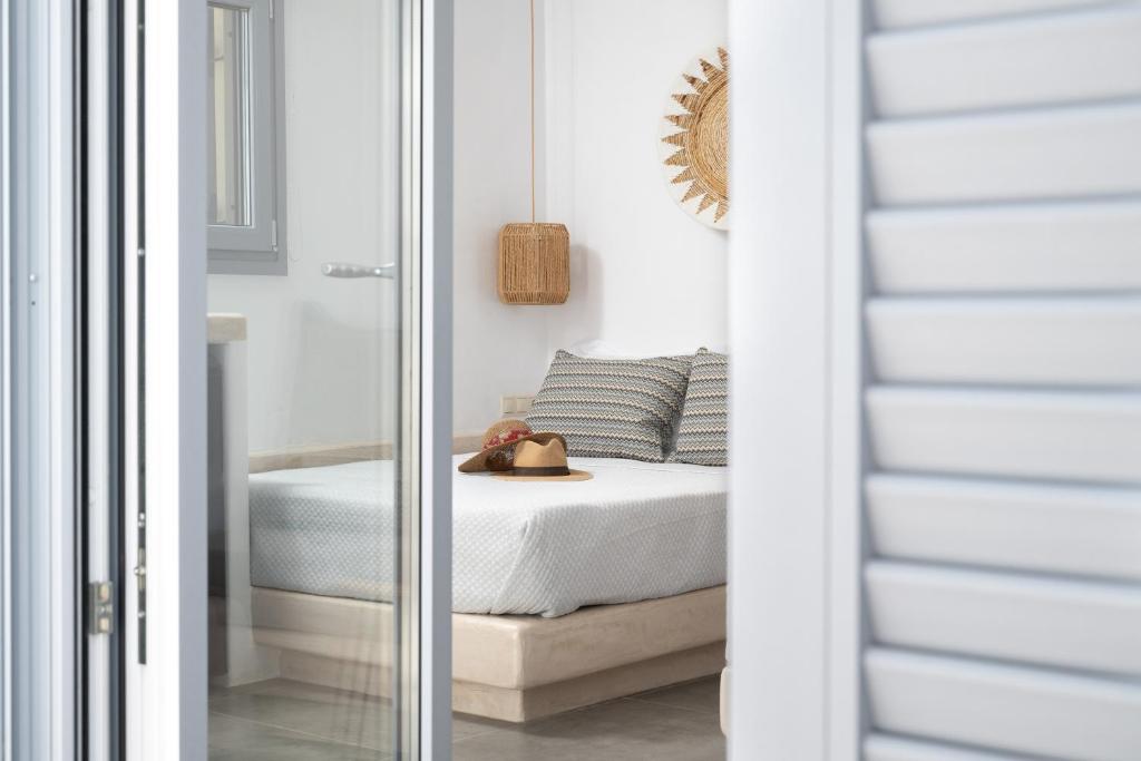 Postel nebo postele na pokoji v ubytování Naxos Seahouse