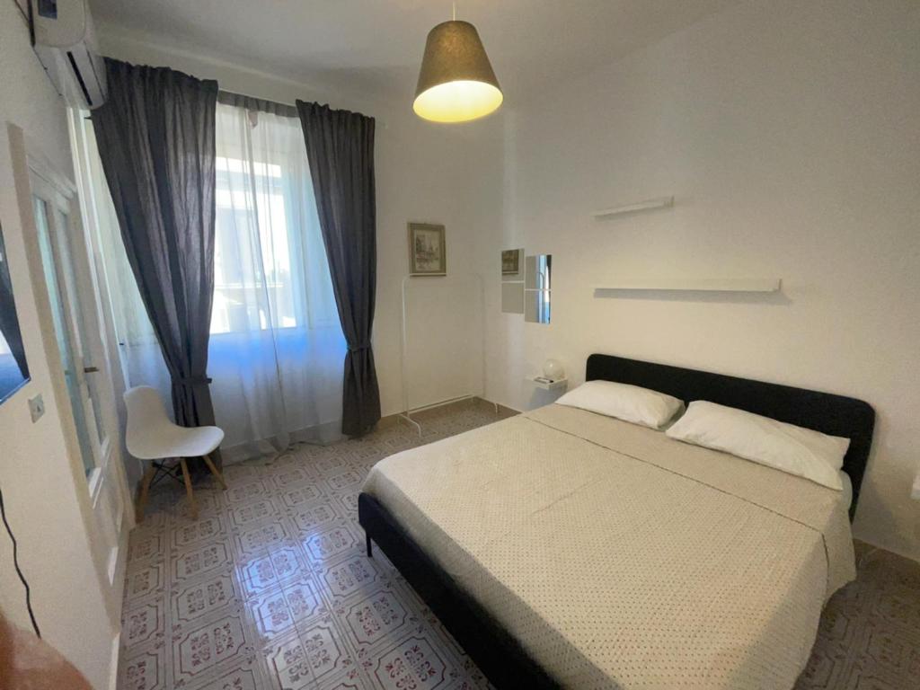 Postel nebo postele na pokoji v ubytování Camera privata