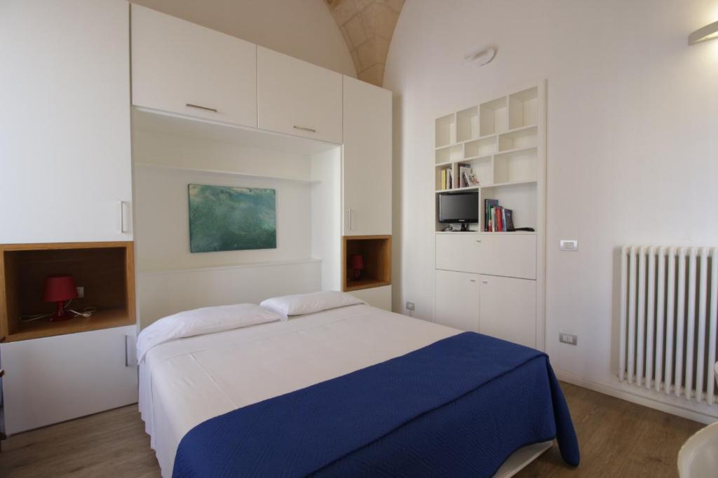 Posteľ alebo postele v izbe v ubytovaní GoodStay Al 14 (monolocale)