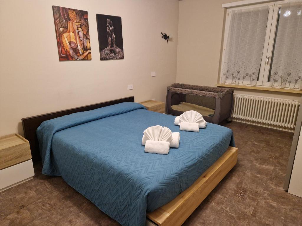Posteľ alebo postele v izbe v ubytovaní Infinite Blue
