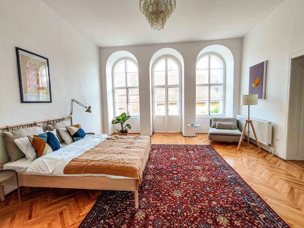 Postel nebo postele na pokoji v ubytování Favst Old Square