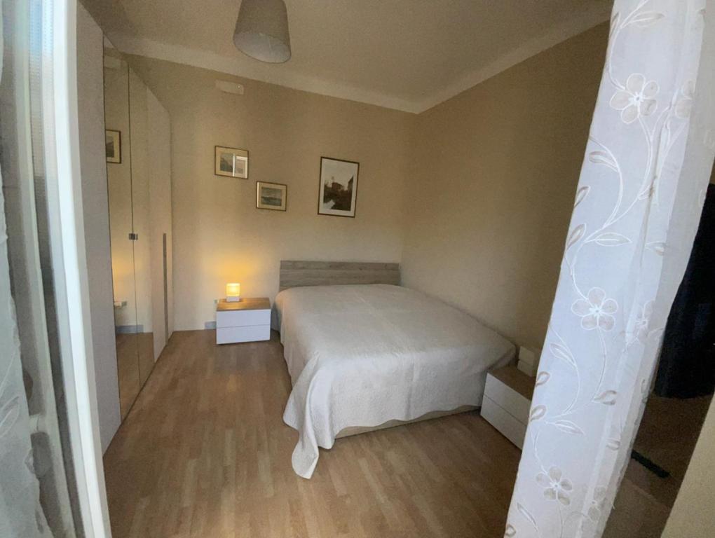 Postel nebo postele na pokoji v ubytování Camera privata vicino spiaggia