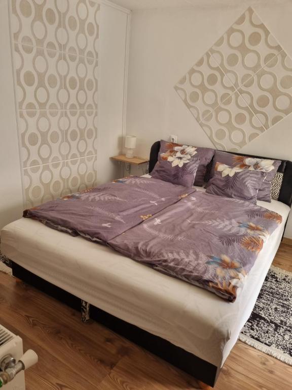 Posteľ alebo postele v izbe v ubytovaní Napfény Apartman