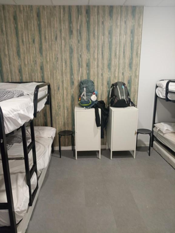 Postel nebo postele na pokoji v ubytování Hostel Allegro