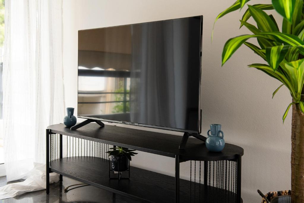 Χώρος καθιστικού στο Glyfada First Class Suite