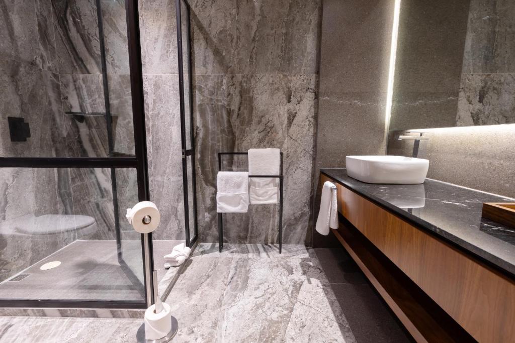 Koupelna v ubytování Hotel Noite Business Class