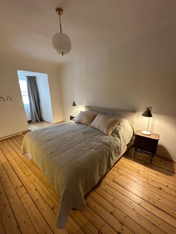 Postel nebo postele na pokoji v ubytování Graz 1464, Old City Center Apartments