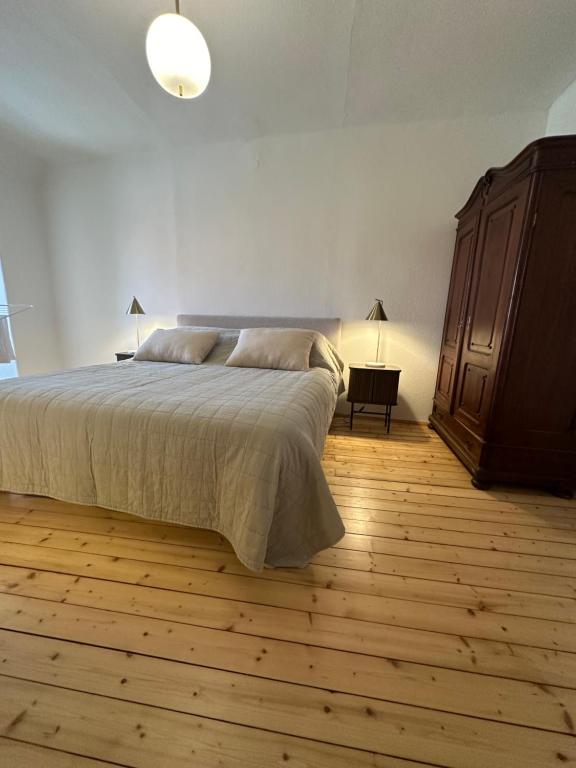 Postel nebo postele na pokoji v ubytování Graz 1464, Old City Center Apartments