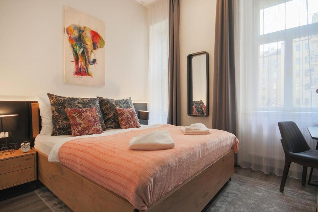 Postel nebo postele na pokoji v ubytování CORU House