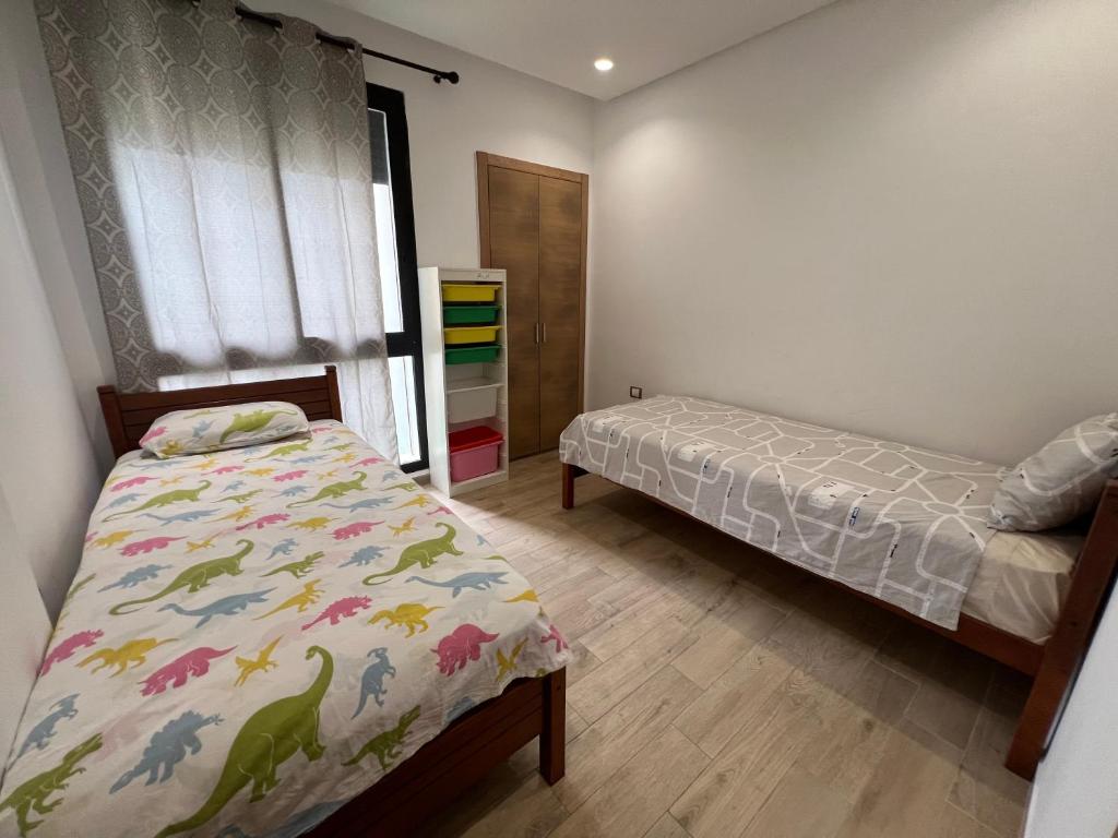 Postel nebo postele na pokoji v ubytování Plage des Nations Prestigia Vue sur mer