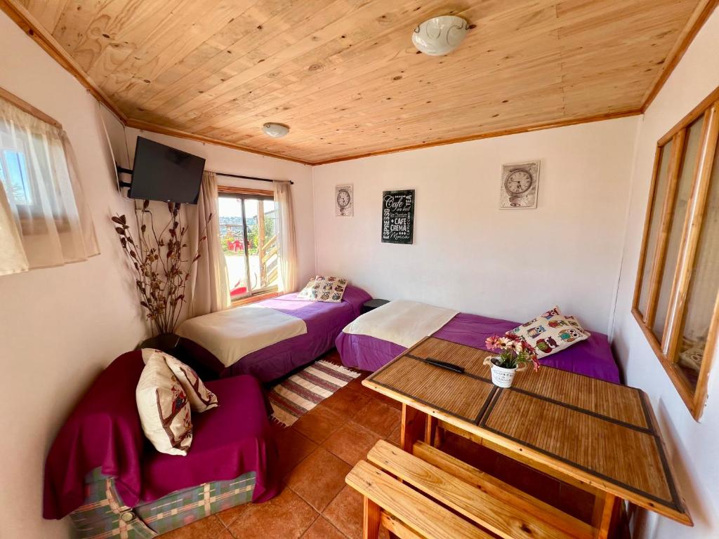 Postel nebo postele na pokoji v ubytování Cabañas DeMAICO