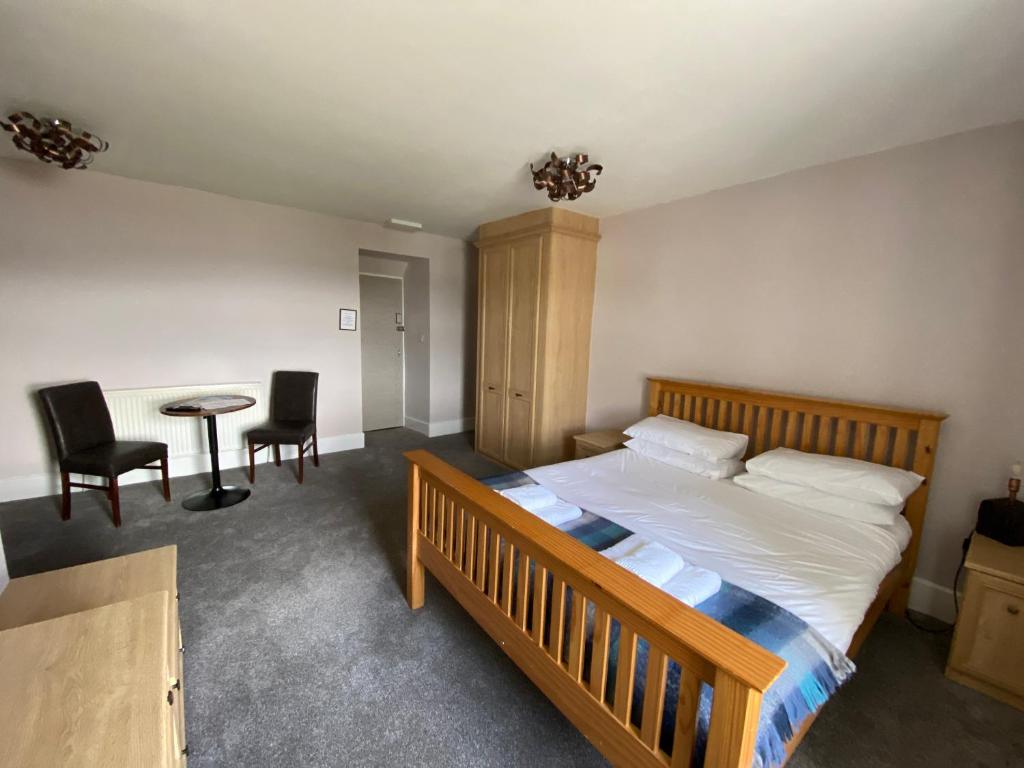 Postel nebo postele na pokoji v ubytování Bunessan Inn