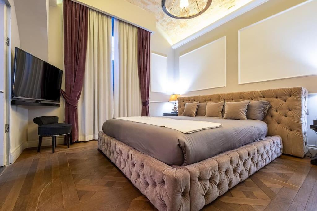 Postel nebo postele na pokoji v ubytování La Casa dei Sogni Roma