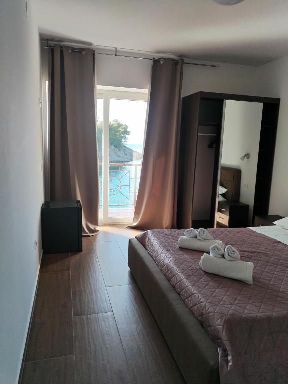 Postel nebo postele na pokoji v ubytování Boarding house Vide