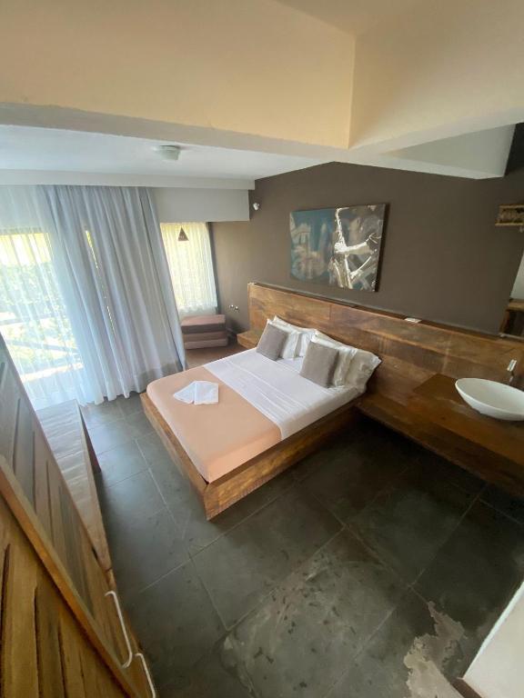 Cama ou camas em um quarto em Pousada Arágua