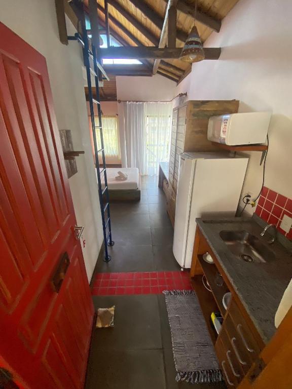 A cozinha ou cozinha compacta de Pousada Arágua