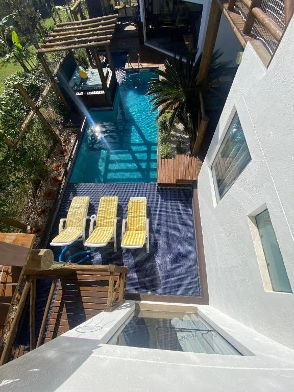 A piscina localizada em Pousada Arágua ou nos arredores