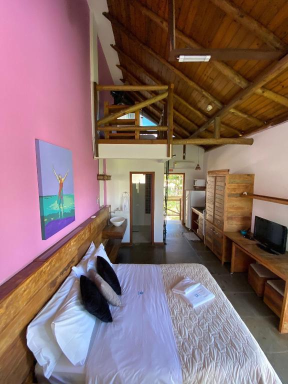 Cama ou camas em um quarto em Pousada Arágua