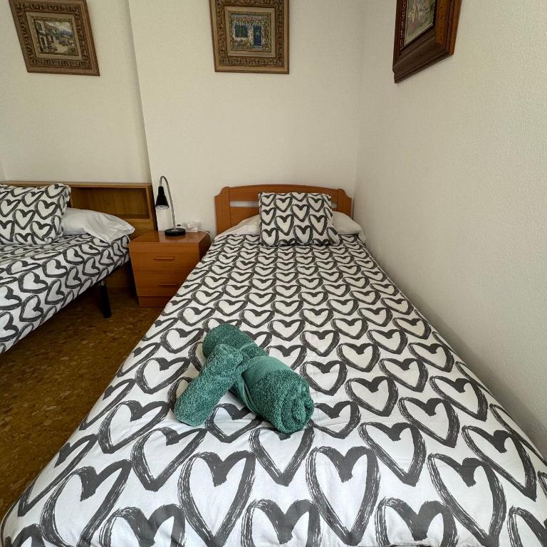 Postel nebo postele na pokoji v ubytování Habitaciones en GANDIA a 5 min del centro histórico