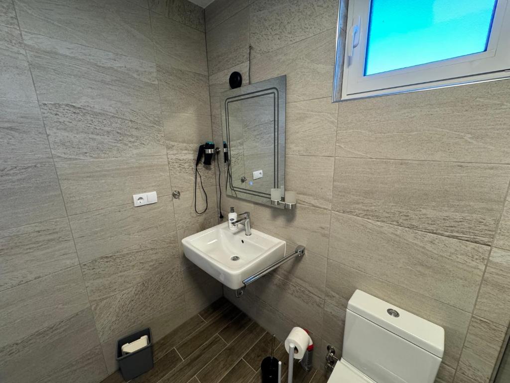 Koupelna v ubytování Adla Apartmani