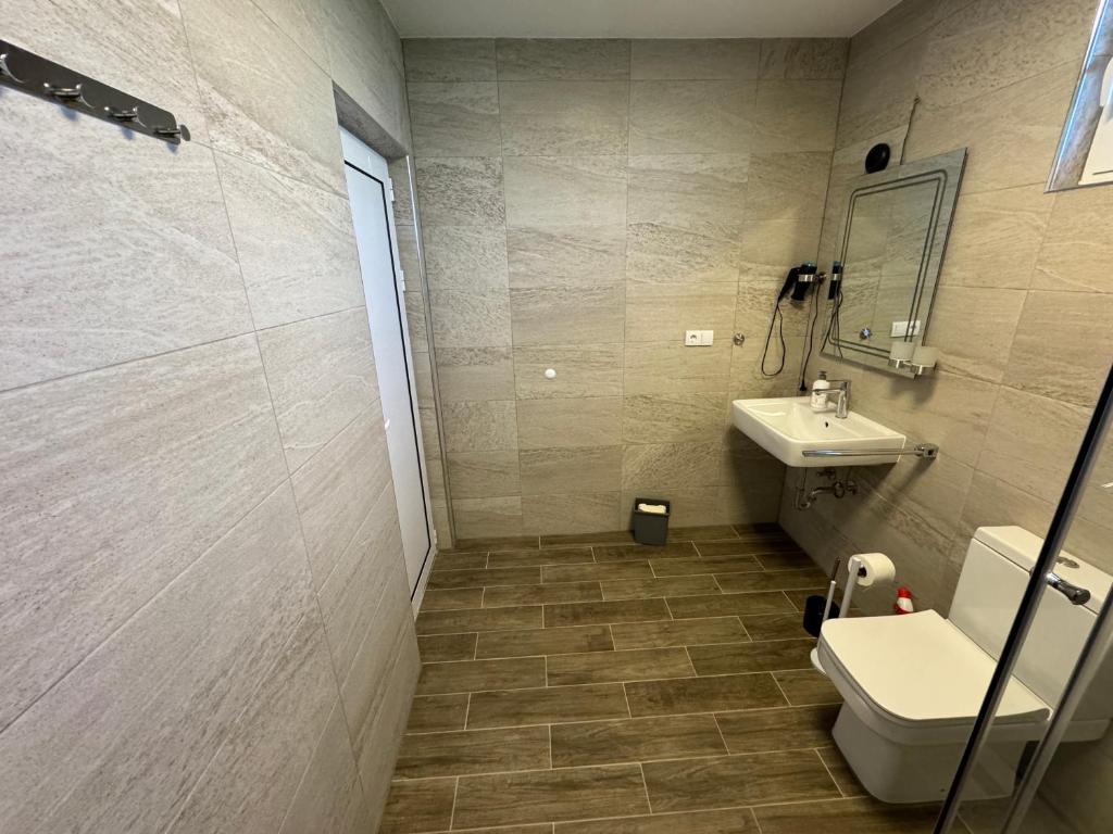Koupelna v ubytování Adla Apartmani
