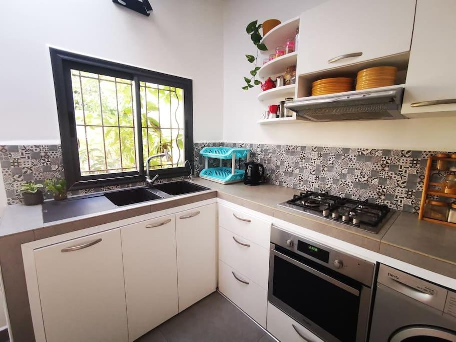 Kuchyň nebo kuchyňský kout v ubytování Villa Familiale Deluxe - Vue mer