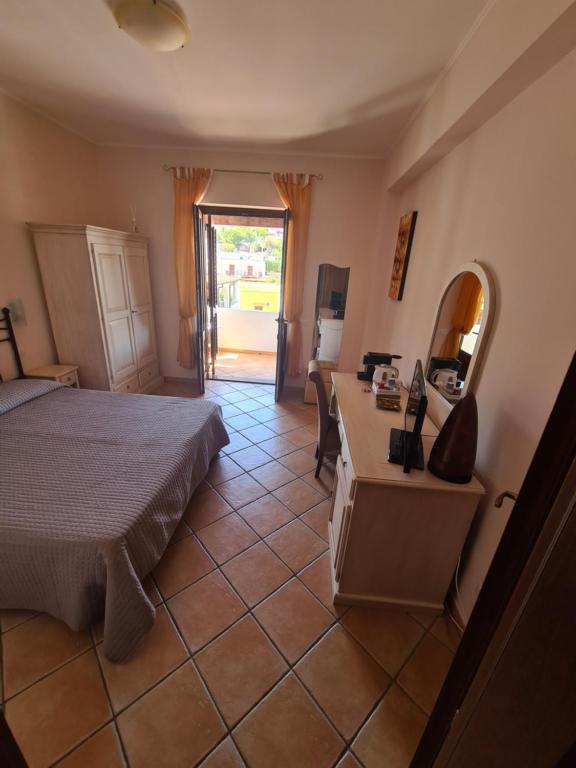 Postel nebo postele na pokoji v ubytování Affittacamere A f r o d i t e