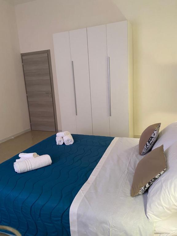 Letto o letti in una camera di LaPignaapartments